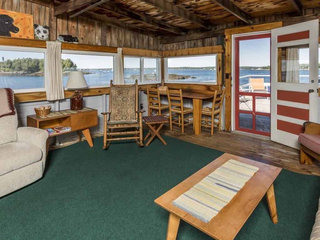 153-260 Van Horn Road East Boothbay, ME 04544 - Photo 4 of 25 The wharf house sun room with pine floor