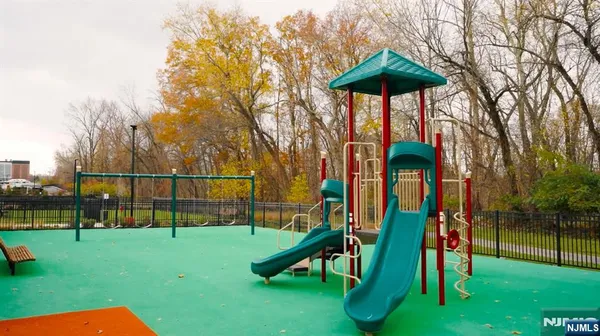 a view of park with swings