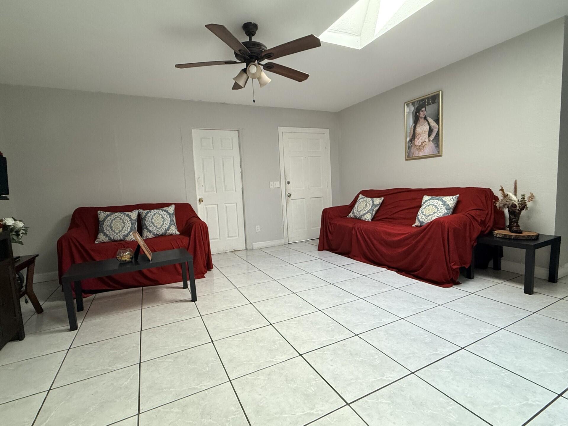 4904 Myrtle Drive Fort Pierce, FL 34982 - Photo 5 of 18 a living room with furniture