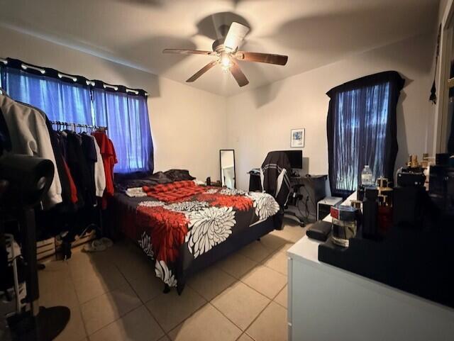 4904 Myrtle Drive Fort Pierce, FL 34982 - Photo 9 of 18 a bedroom with a bed and dresser