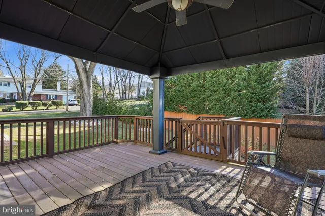 a view of a wooden deck with a patio