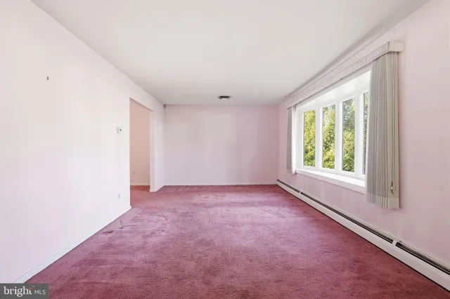 an empty room with a window