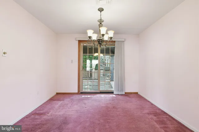 a view of a chandelier in a room