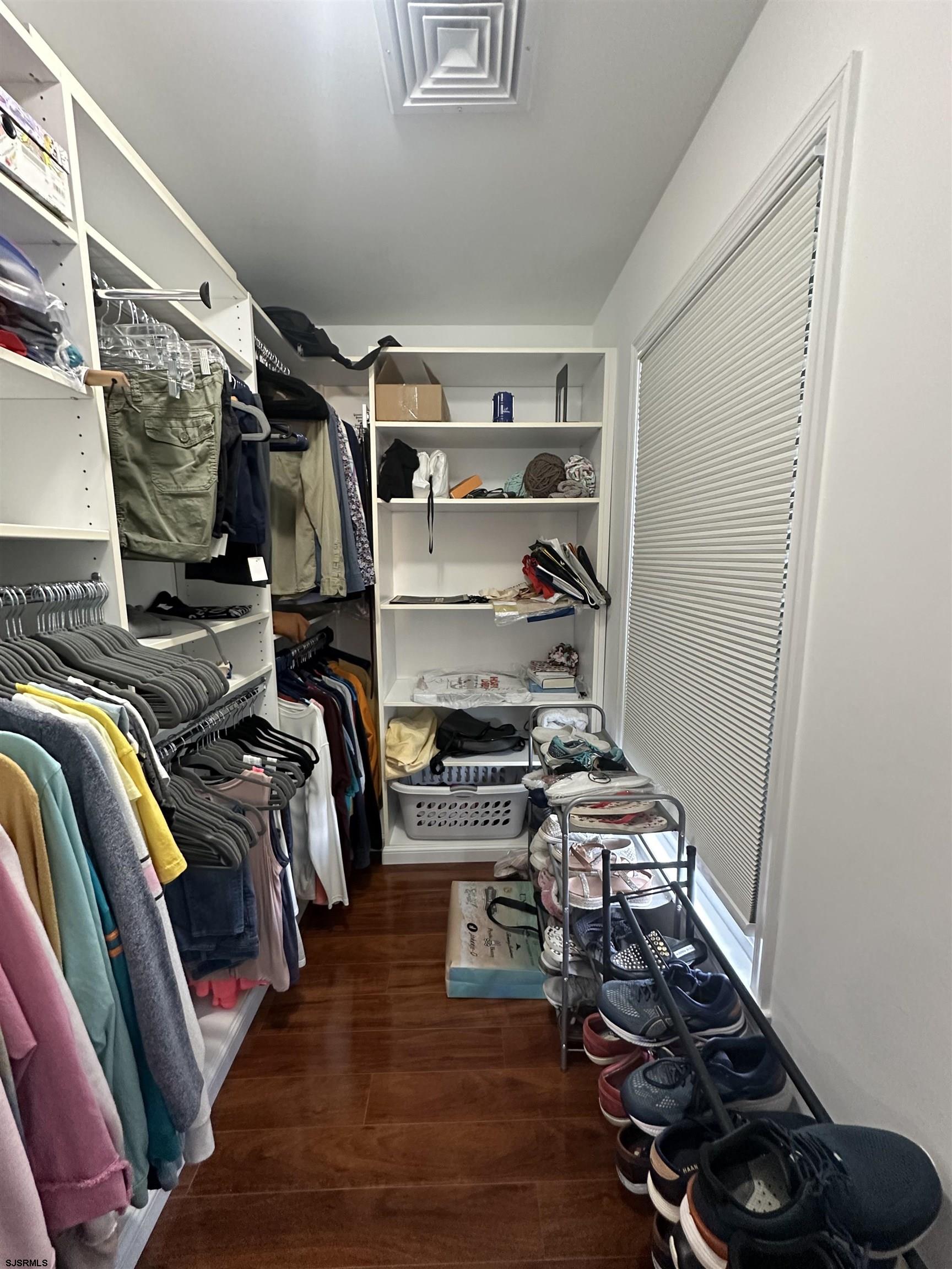 5701 Ventnor Avenue, Unit 5/217/31 Ventnor City, NJ 08406 - Photo 25 of 44 a view of walk in closet with clothes and shoes