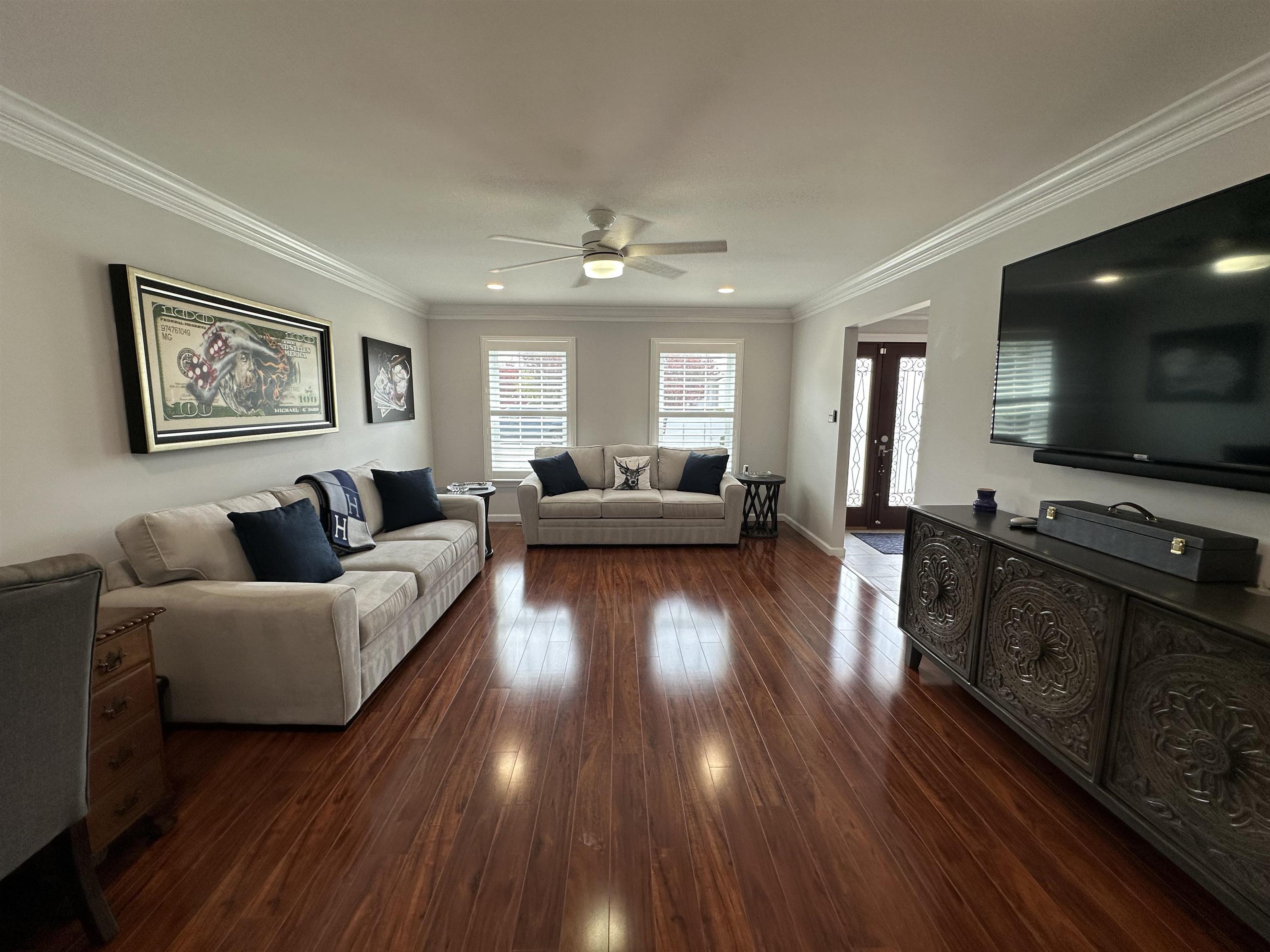 5701 Ventnor Avenue, Unit 5/217/31 Ventnor City, NJ 08406 - Photo 3 of 44 a living room with furniture and a flat screen tv