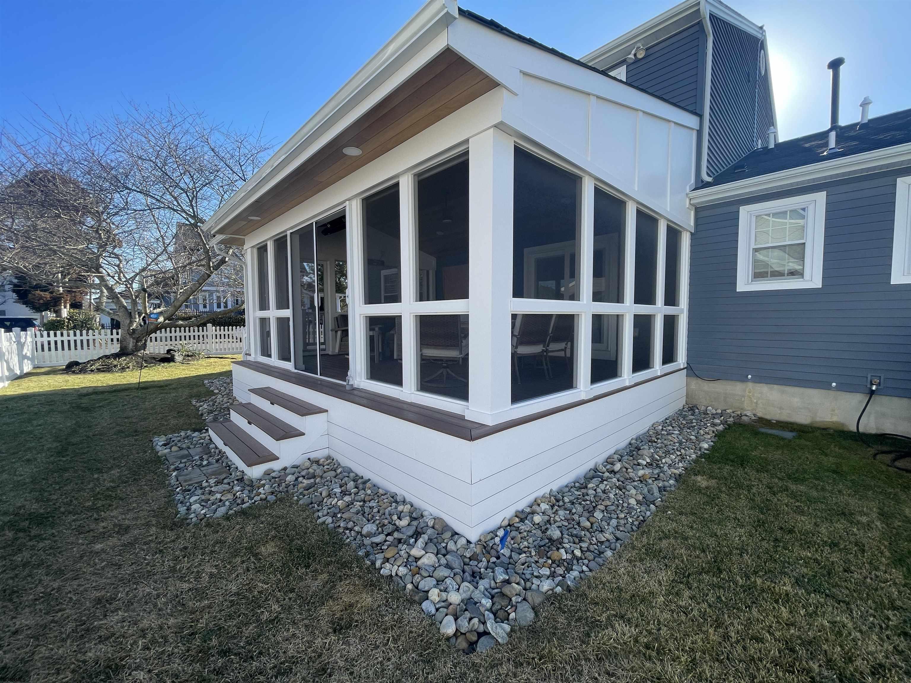 5701 Ventnor Avenue, Unit 5/217/31 Ventnor City, NJ 08406 - Photo 39 of 44 a view of a house with a yard