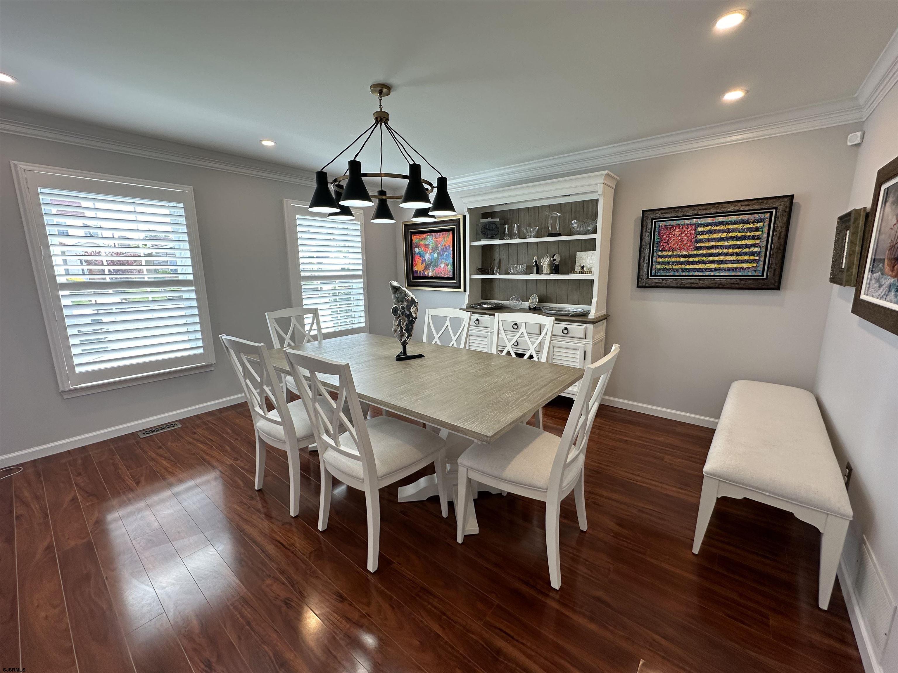 5701 Ventnor Avenue, Unit 5/217/31 Ventnor City, NJ 08406 - Photo 8 of 44 a view of a dining room with furniture window and wooden floor