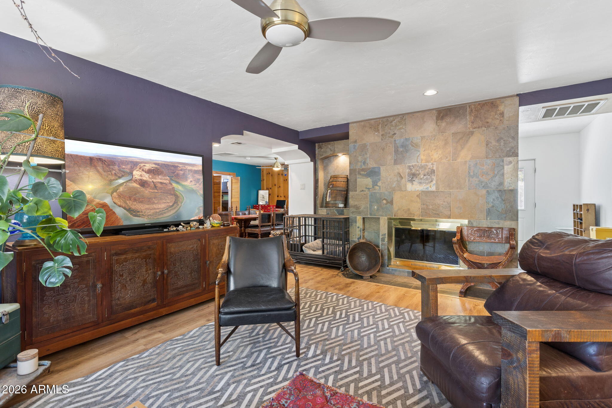 2245 East Osborn Road Phoenix, AZ 85016 - Photo 3 of 67 Living room with wood-burning fireplace