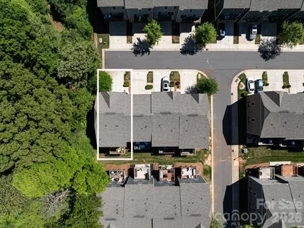 an aerial view of a city with lots of residential buildings