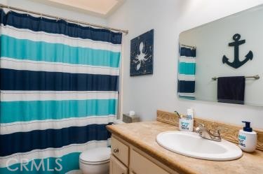 4227 Shadowcrest Drive Santa Maria, CA 93455 - Photo 14 of 21 a bathroom with a sink and a mirror