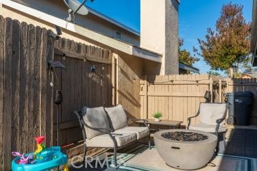 4227 Shadowcrest Drive Santa Maria, CA 93455 - Photo 15 of 21 a view of a patio with couches and potted plants