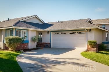 4227 Shadowcrest Drive Santa Maria, CA 93455 - Photo 2 of 21 a front view of a house with garden