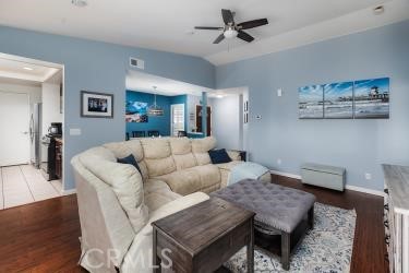 4227 Shadowcrest Drive Santa Maria, CA 93455 - Photo 5 of 21 a living room with furniture and a wooden floor