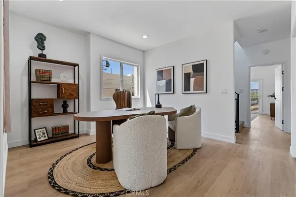 a living room with furniture and window