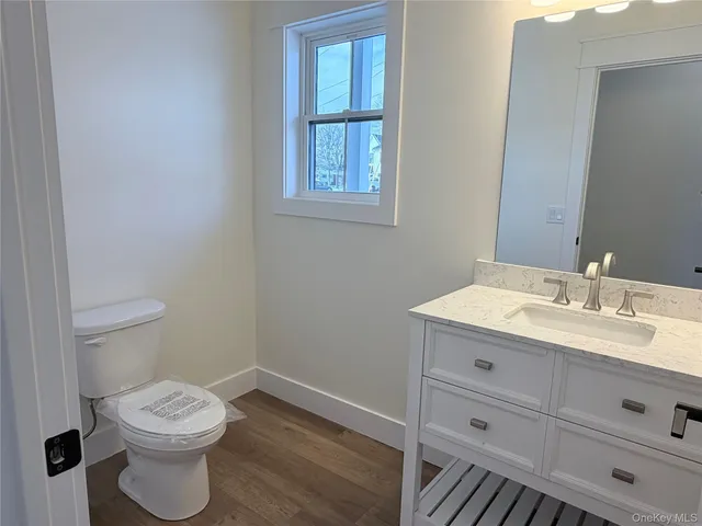 a white bath tub sitting next to a window
