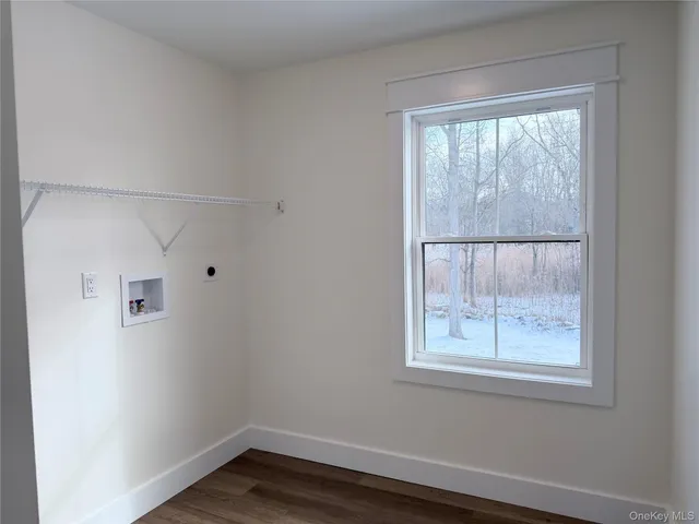 a black and white photo of a living room