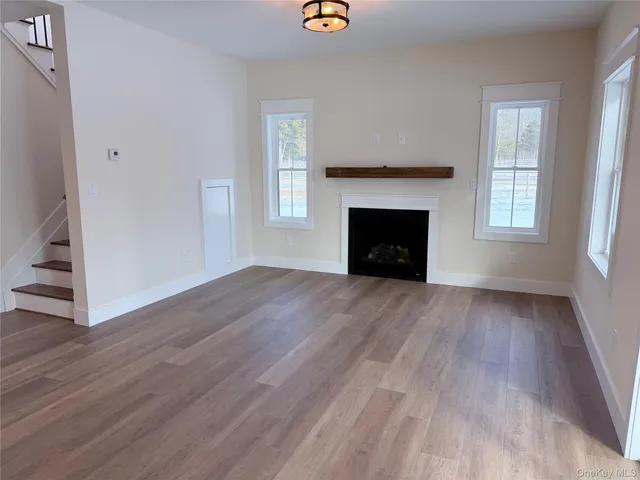 a white bath tub sitting next to a shower