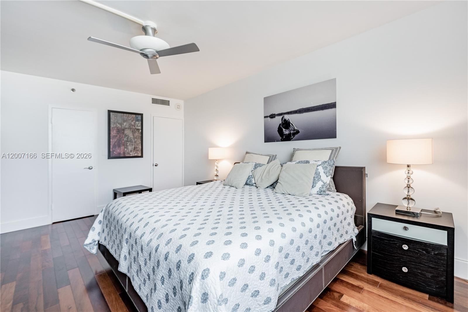 100 Lincoln Road, Unit 944 Miami Beach, FL 33139 - Photo 15 of 40 a bedroom with a bed and a night stand