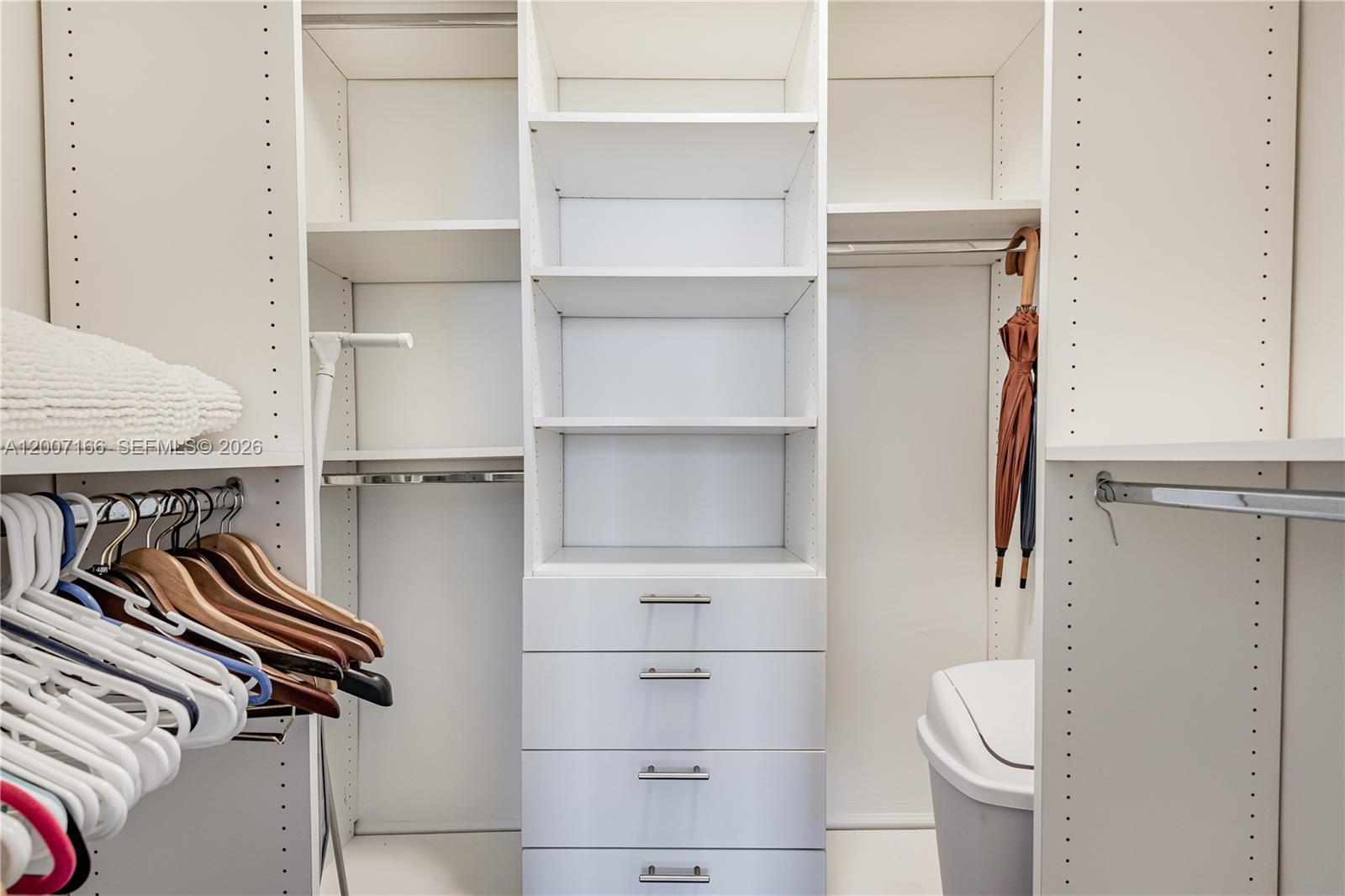 100 Lincoln Road, Unit 944 Miami Beach, FL 33139 - Photo 20 of 40 a view of walk in closet with empty racks