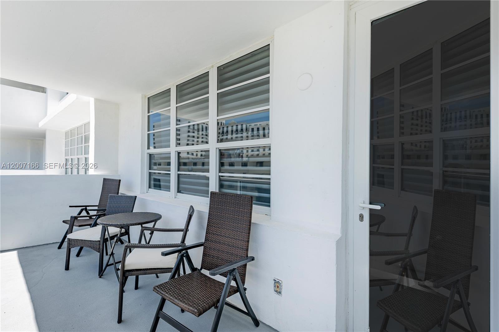 100 Lincoln Road, Unit 944 Miami Beach, FL 33139 - Photo 24 of 40 a view of a room with furniture and windows