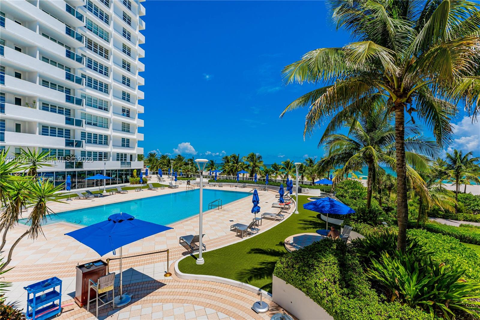 100 Lincoln Road, Unit 944 Miami Beach, FL 33139 - Photo 37 of 40 a view of swimming pool with outdoor seating and plants