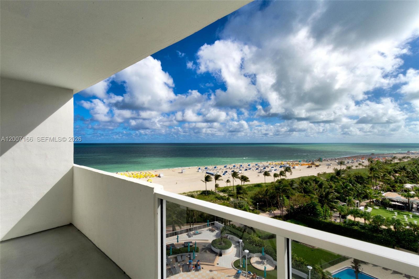 100 Lincoln Road, Unit 944 Miami Beach, FL 33139 - Photo 38 of 40 a view of a balcony with wooden fence