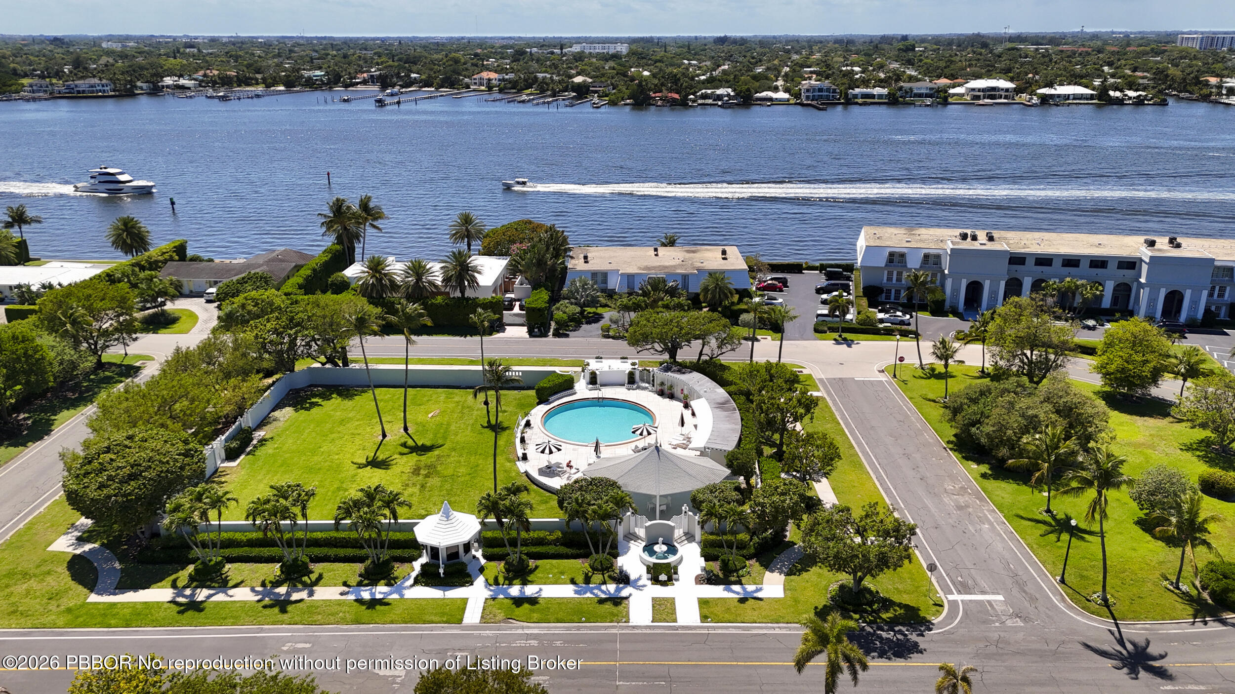 2259 Ibis Isle Road East, Unit E Palm Beach, FL 33480 - Photo 28 of 28 an aerial view of swimming pool with outdoor seating and mountain view