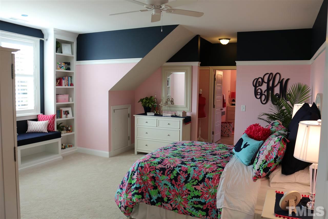 1108 Overlook Ridge Road Wake Forest, NC 27587 - Photo 12 of 14 a bedroom with bed and a painting