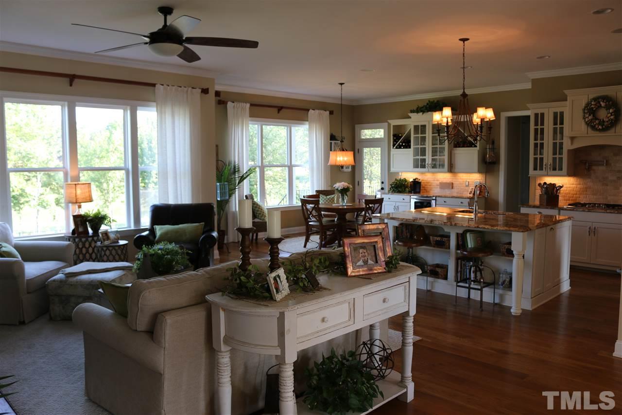 1108 Overlook Ridge Road Wake Forest, NC 27587 - Photo 4 of 14 a living room with furniture and a large window