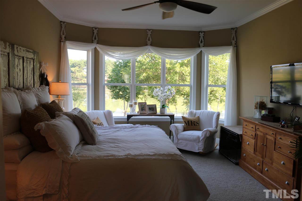 1108 Overlook Ridge Road Wake Forest, NC 27587 - Photo 8 of 14 a living room with furniture and a large window