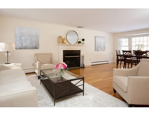 62 Woodridge Road Wayland, MA 01778 - Photo 2 of 11 a living room with furniture a fireplace and a window