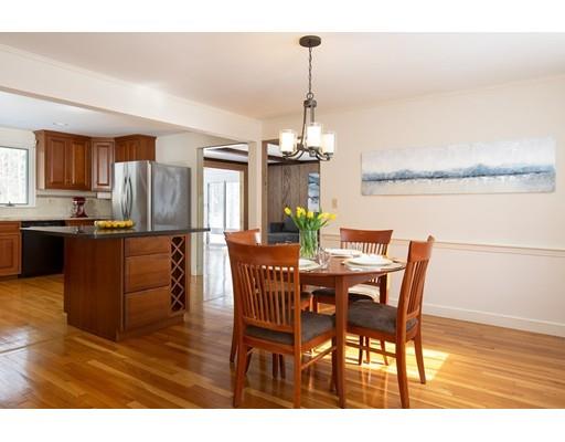 62 Woodridge Road Wayland, MA 01778 - Photo 4 of 11 a view of a dining room with furniture and wooden floor