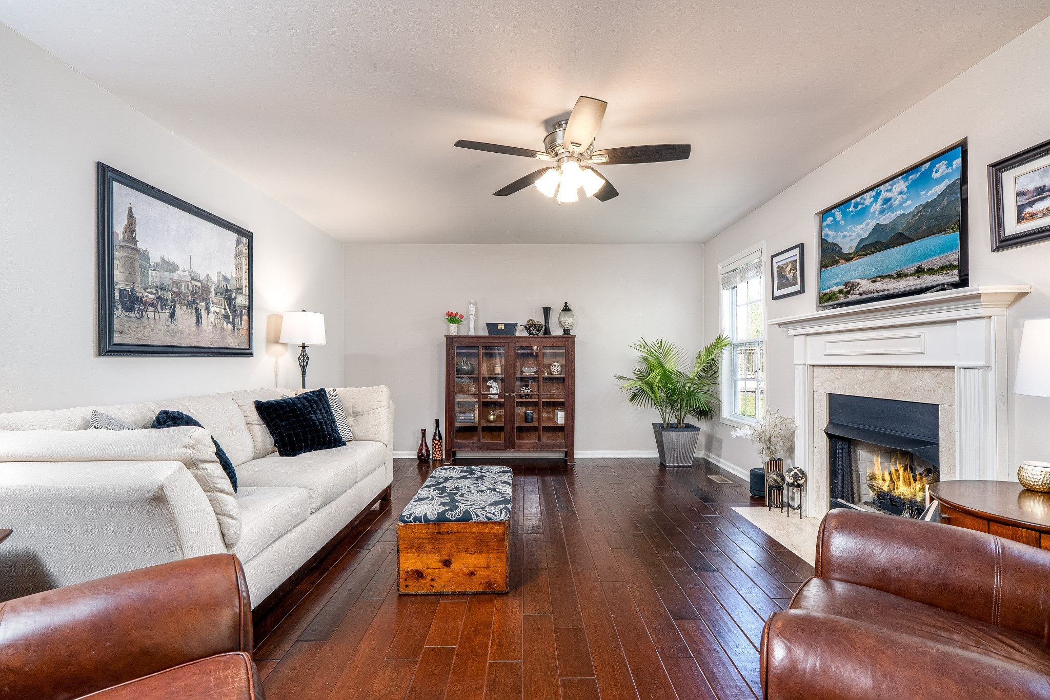 2102 Burgess Lane Spring Hill, TN 37174 - Photo 10 of 45 a living room with furniture fireplace and wooden floor
