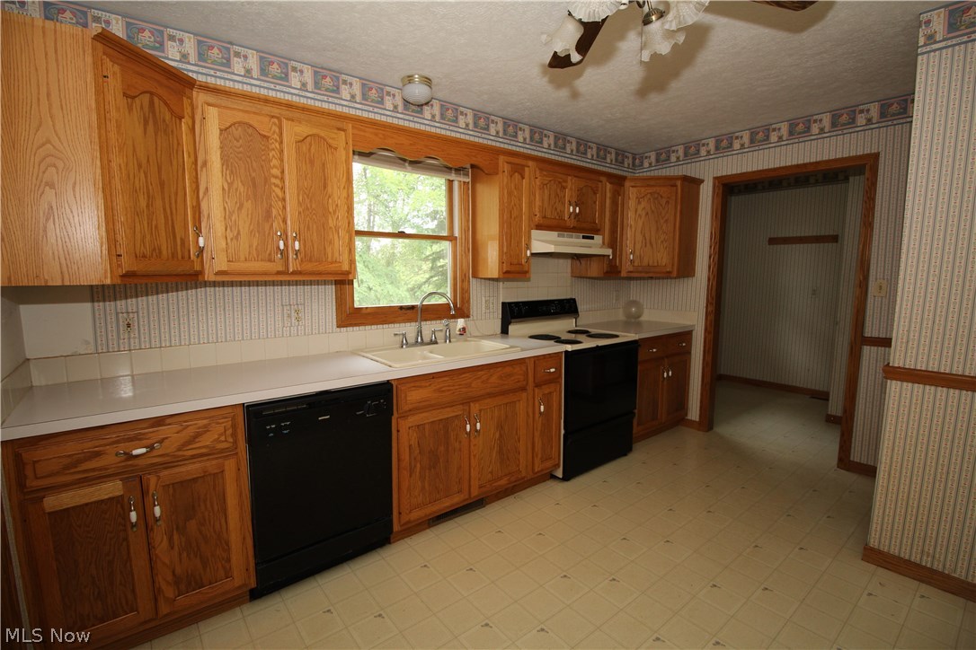 4534 Emma Place Northwest Canton, OH 44708 - Photo 4 of 15 Kitchen - plenty of cabinet space - doorway at right of photo leads to first floor laundry