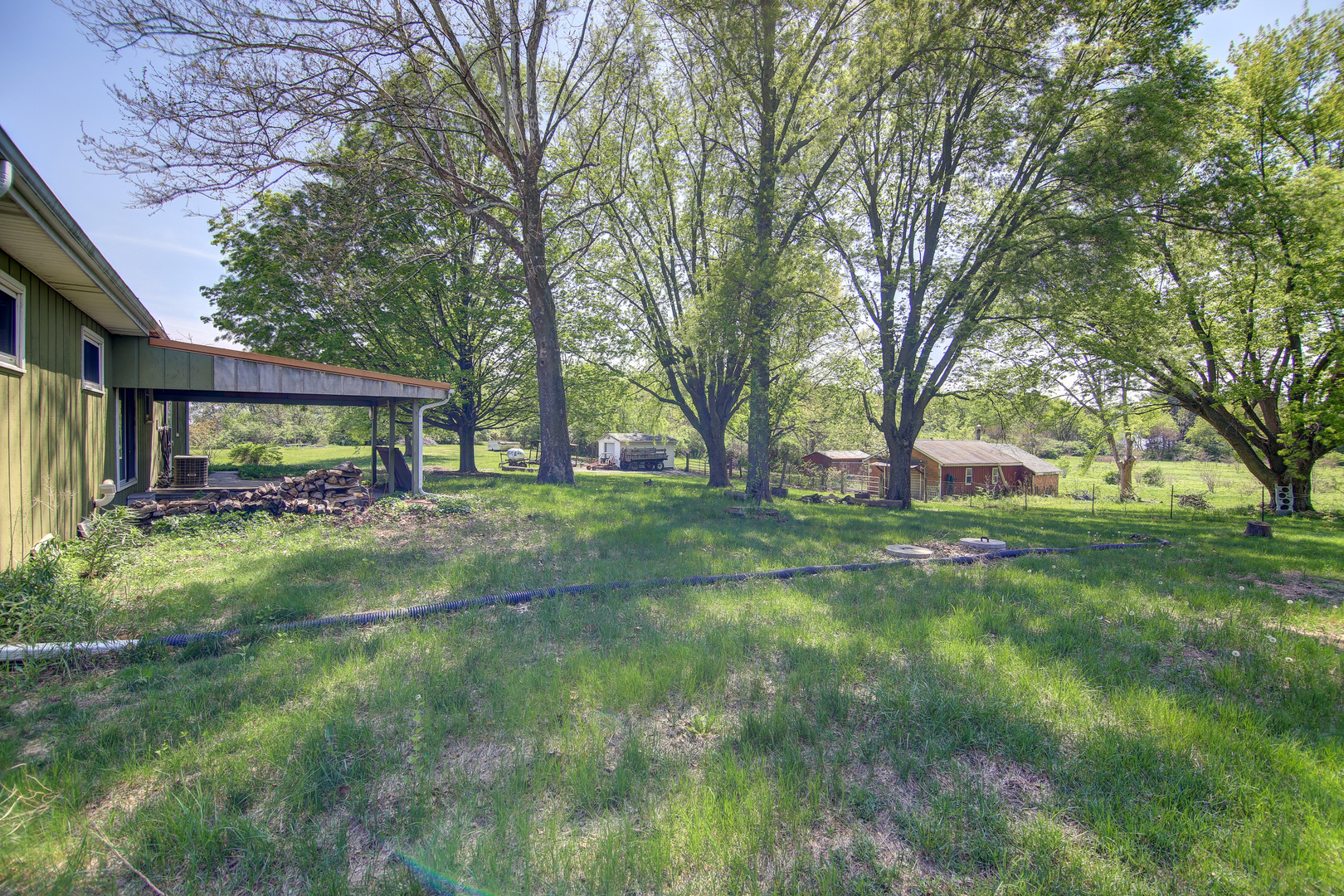 134 Summer Road Dixon, IL 61021 - Photo 12 of 34 a view of backyard of house with green space