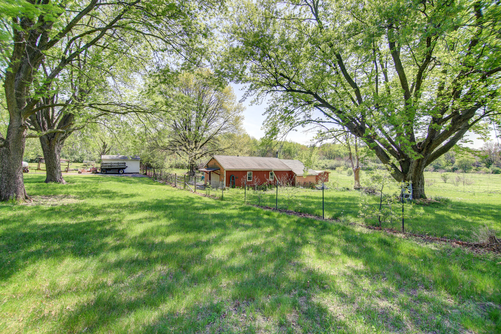 134 Summer Road Dixon, IL 61021 - Photo 15 of 34 a view of a backyard with large trees