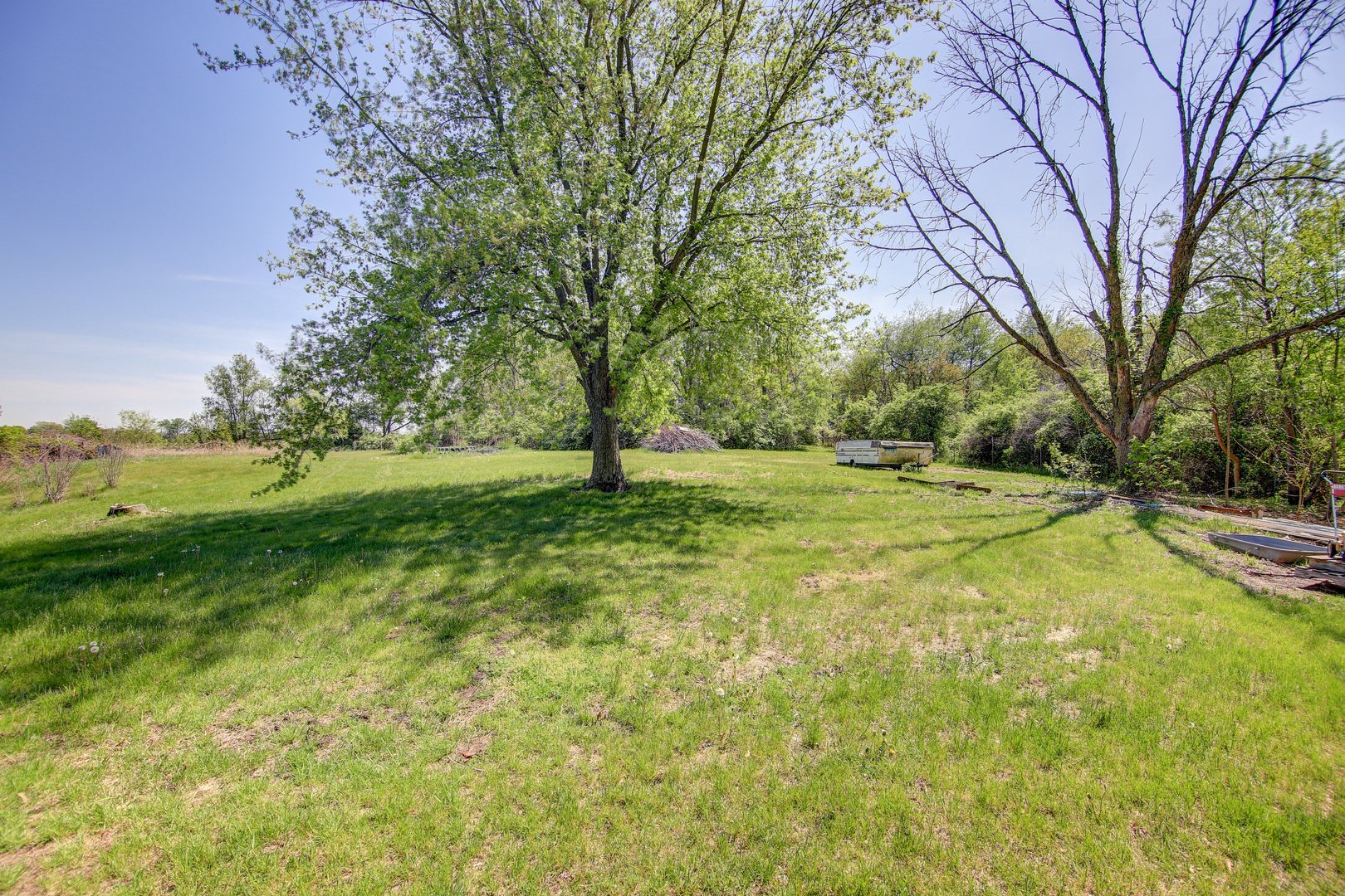 134 Summer Road Dixon, IL 61021 - Photo 17 of 34 a view of a field with trees