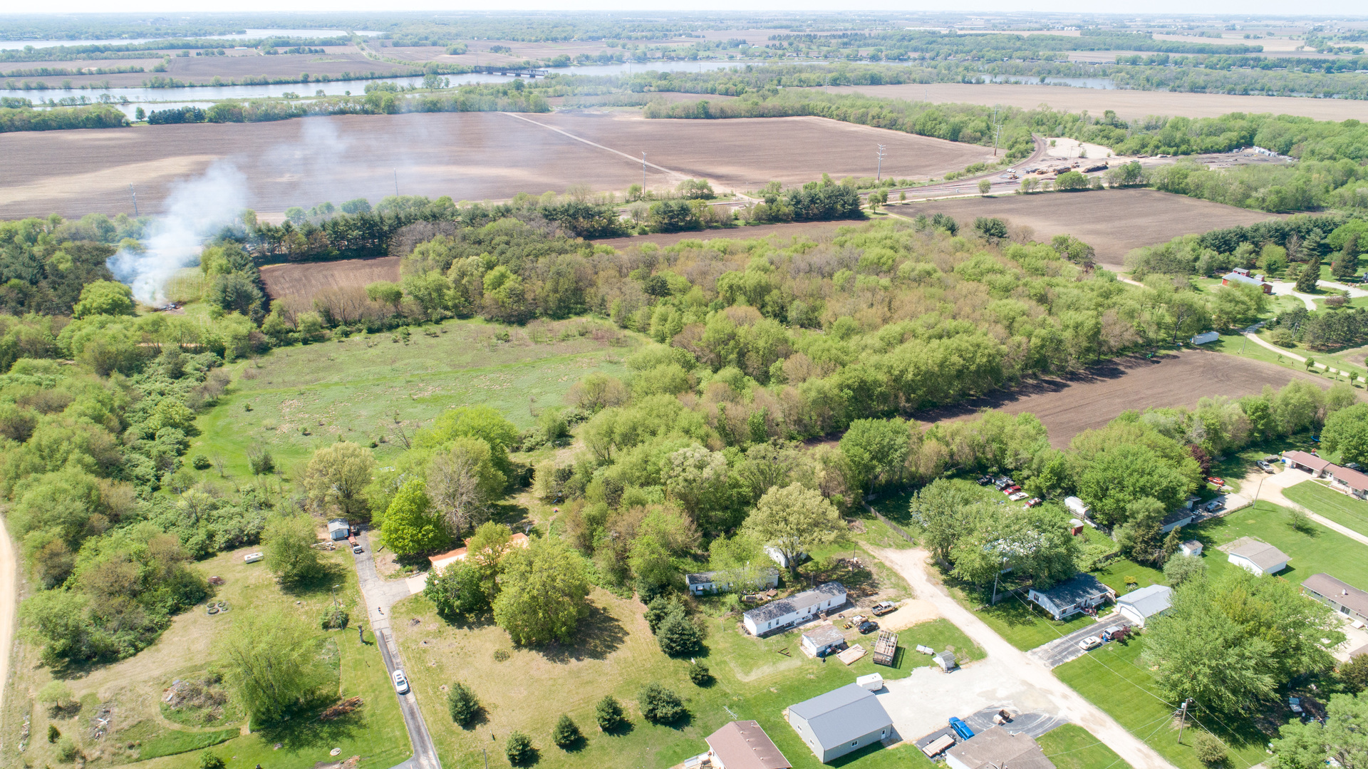 134 Summer Road Dixon, IL 61021 - Photo 18 of 34 an aerial view of residential houses with outdoor space and river