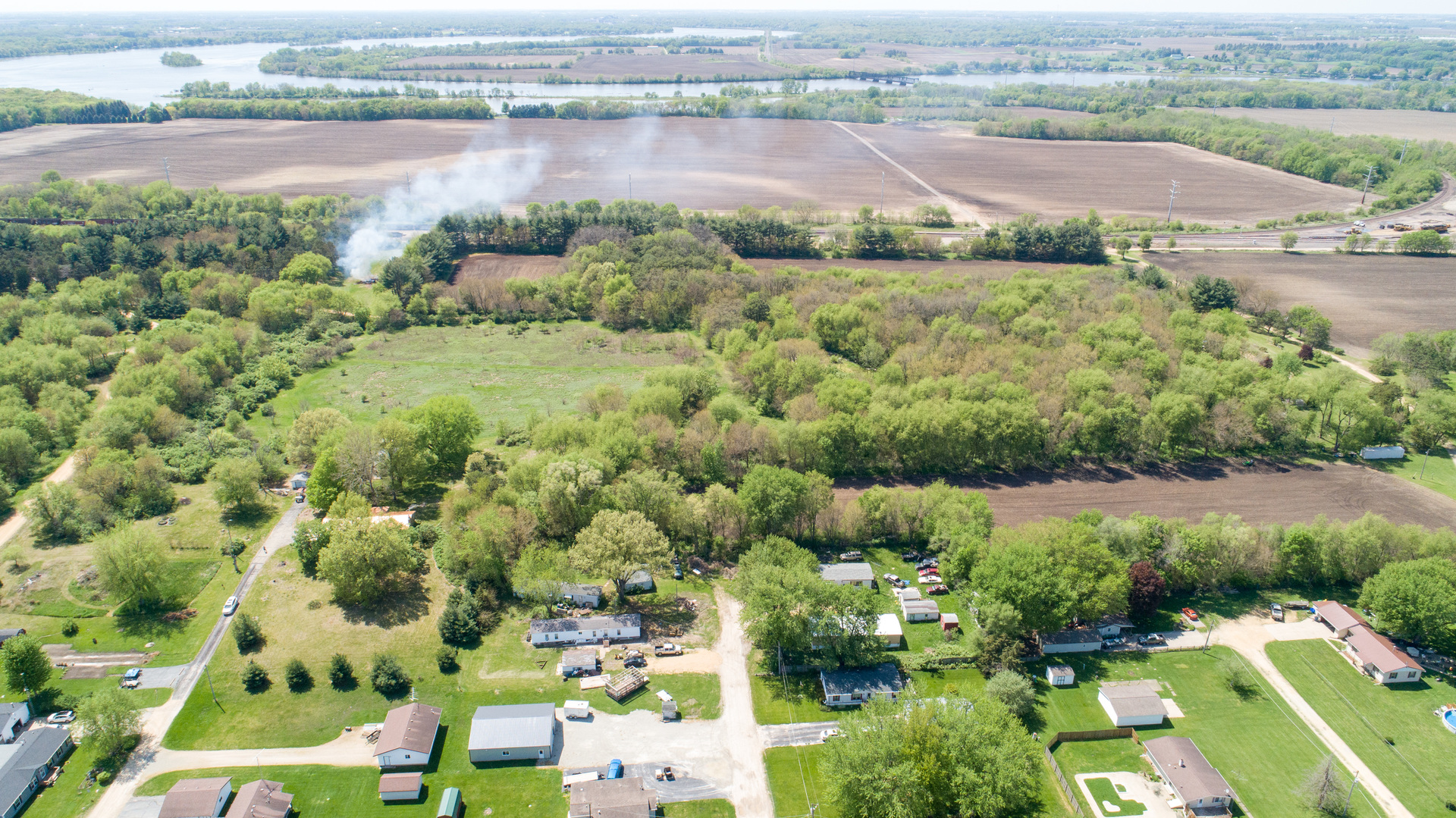 134 Summer Road Dixon, IL 61021 - Photo 19 of 34 an aerial view of residential houses with outdoor space and lake view