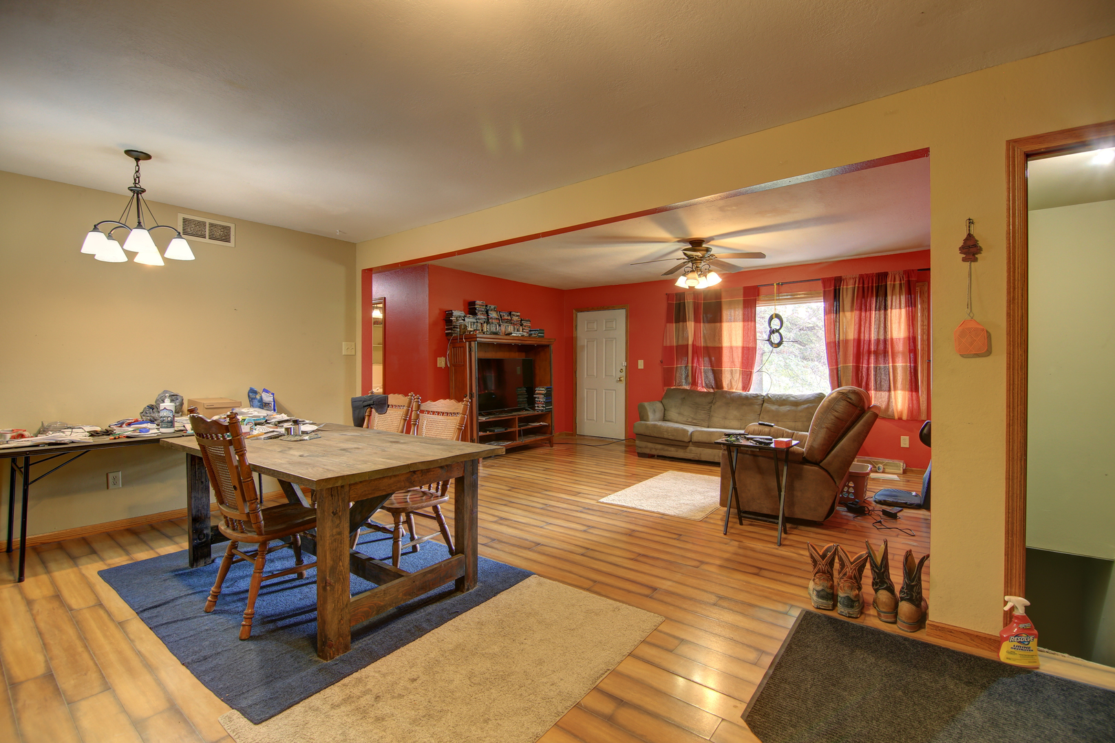 134 Summer Road Dixon, IL 61021 - Photo 3 of 34 a living room with furniture a rug and a chandelier