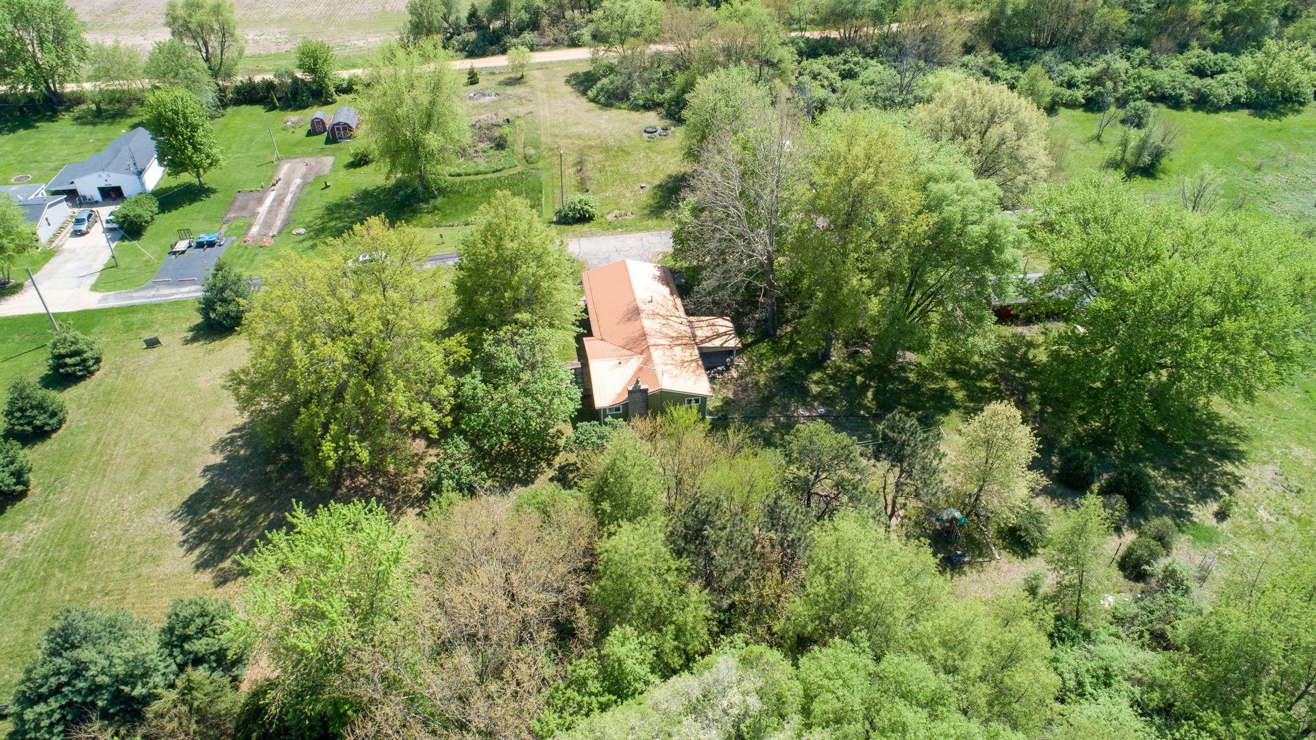 134 Summer Road Dixon, IL 61021 - Photo 34 of 34 an aerial view of residential house with space and trees all around