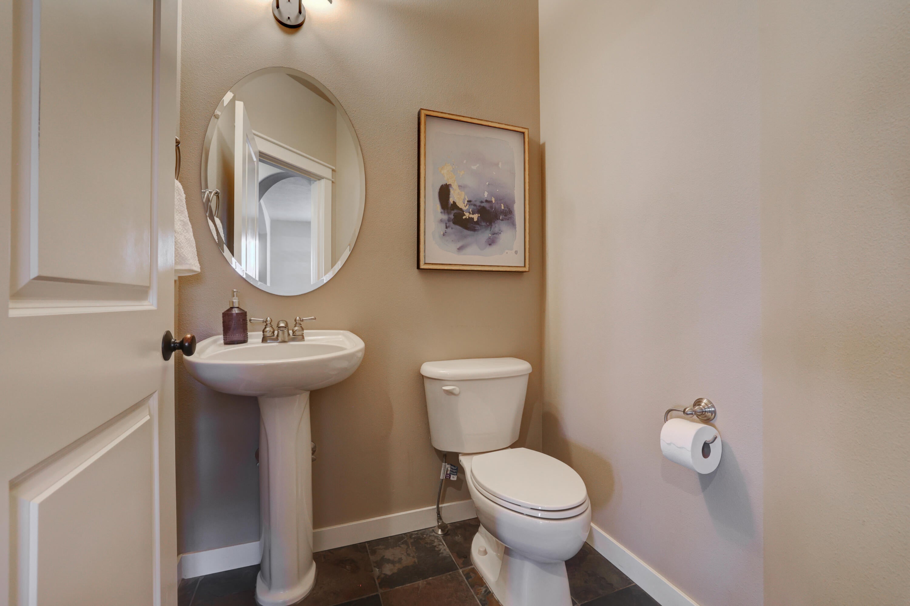 4144 Southwest Rhyolite Place Redmond, OR 97756 - Photo 13 of 44 Downstairs half bathroom