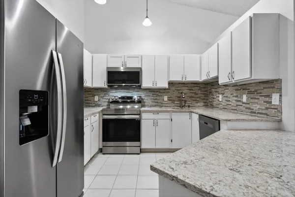 $265,000 | 6572 Chasewood Drive, Unit F, Jupiter, FL 33458