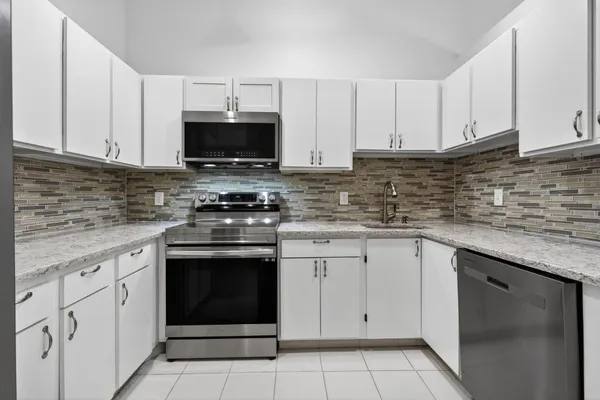 $265,000 | 6572 Chasewood Drive, Unit F, Jupiter, FL 33458