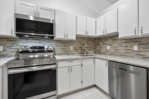 $265,000 | 6572 Chasewood Drive, Unit F, Jupiter, FL 33458