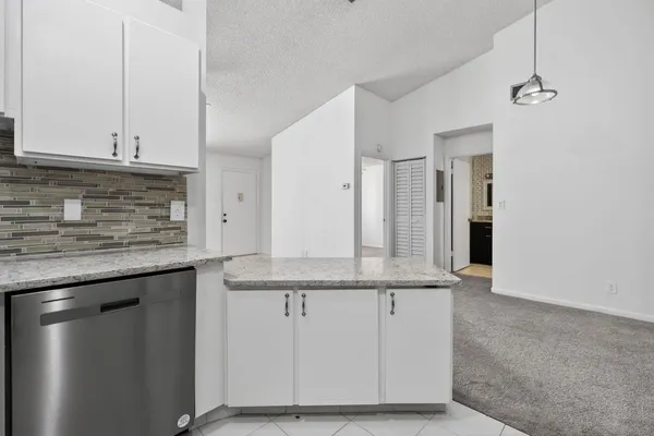 $265,000 | 6572 Chasewood Drive, Unit F, Jupiter, FL 33458