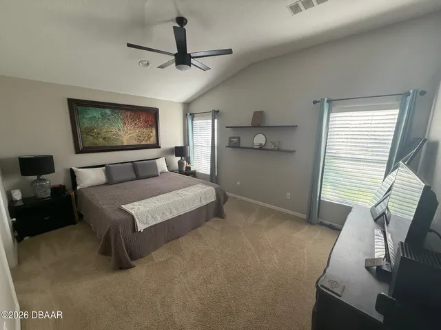 a bathroom with a sink and mirror with toilet