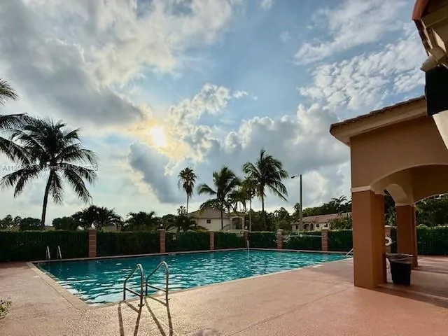 a view of a lake with a big yard