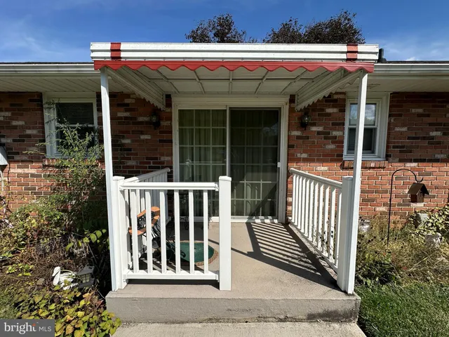 a view of a livingroom with furniture and window