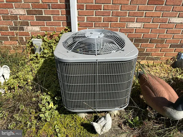 a view of a hallway with wooden shelves